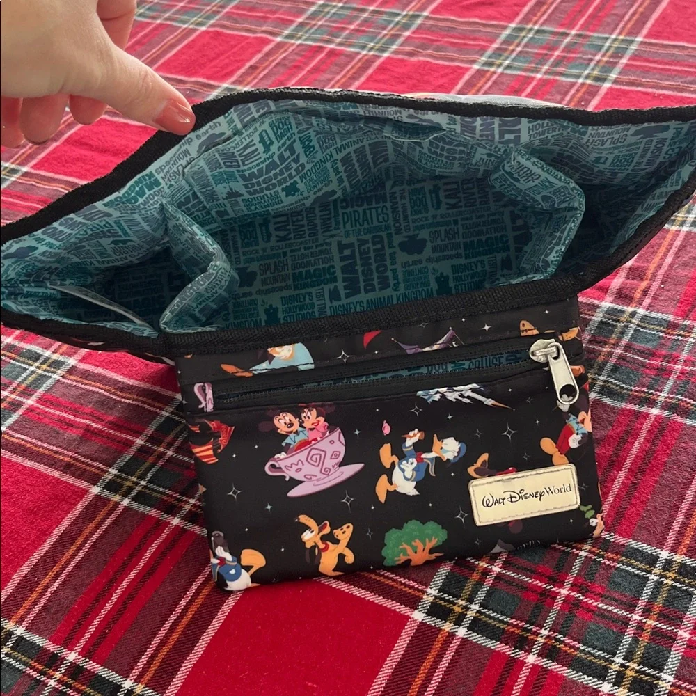 Disney Parks Stroller Organizer featuring an allover character print. GUC
